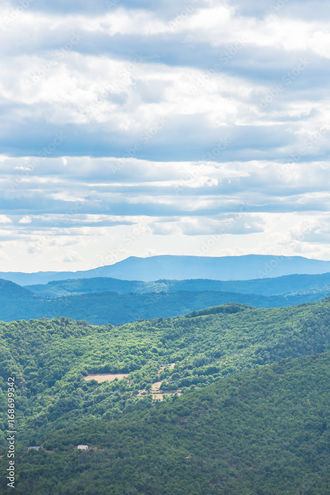 Naklejka premium Light and clouds on Ardeche landscape before the storm, France, in summer 