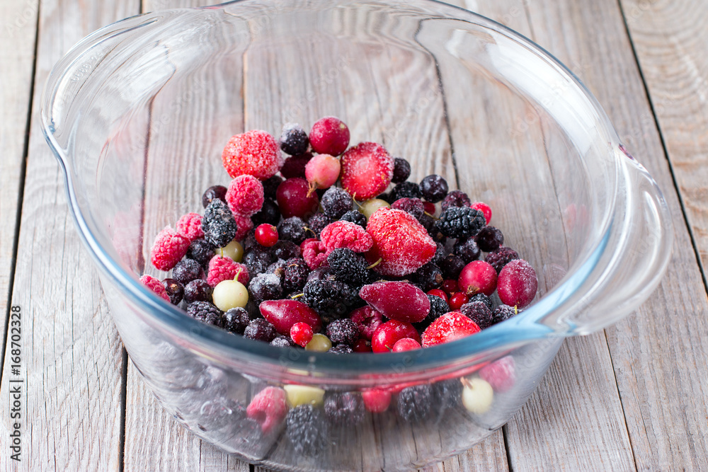 Frozen berries in a glass bowl Frozen berries in a glass bowl