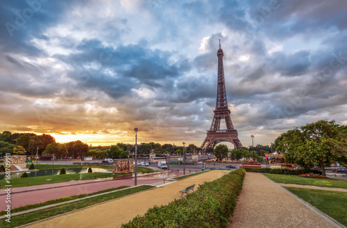 The Eiffel Tower in Paris, France, at sunrise. Spectacular view from the Trocadero gardens. Colourful travel background. Popular travel destination.