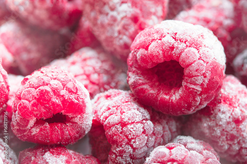 frozen raspberries closeup top view photo