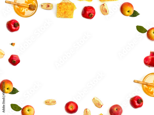 Fototapeta Naklejka Na Ścianę i Meble -  Honey in glass bowl, honey in honeycombs, red apples, garnets, wooden honey dipper and orange flowers on a white background. Top view, flat lay
