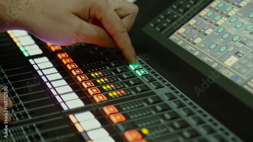 Sound Mixer, Hands Using Sliders for Adjusting Sound photo