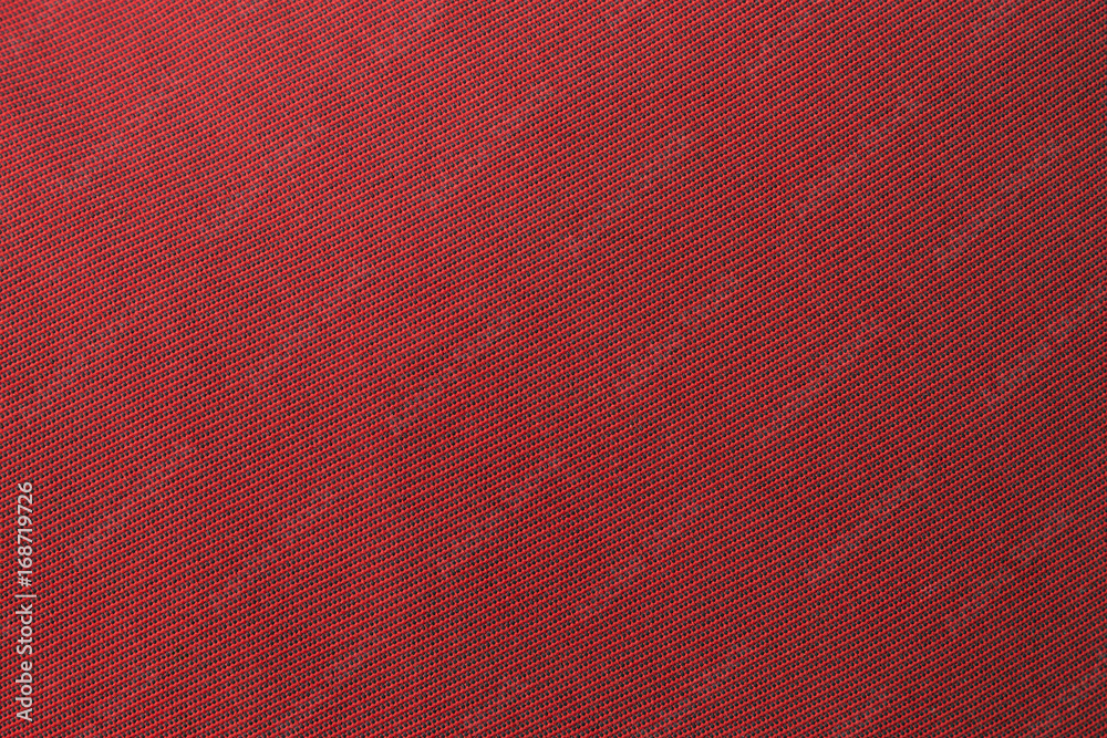 Fototapeta premium The red fabric texture background.