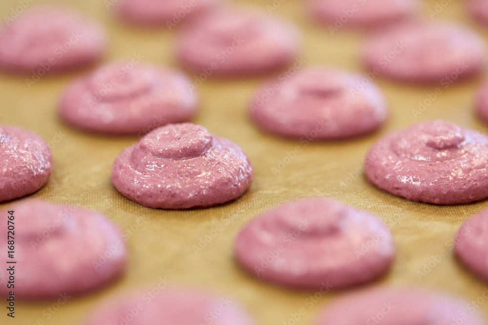 macaron batter or meringue cream on baking paper macaron batter or meringue cream on baking paper