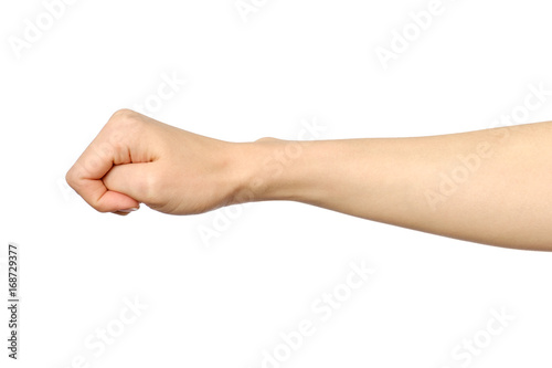 Female hand showing wrong fist gesture isolated on white