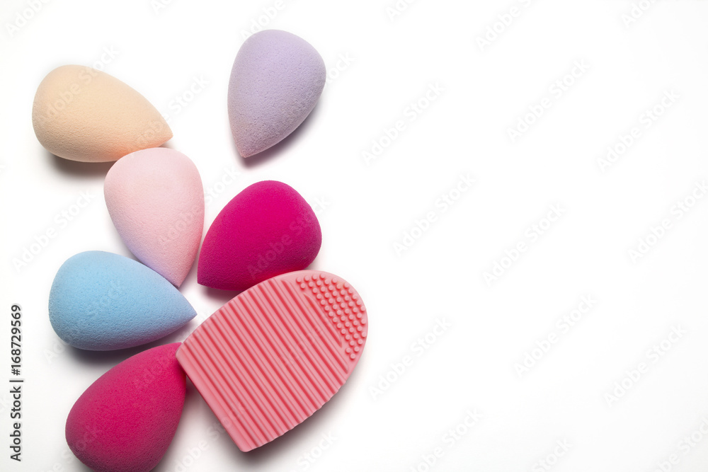 Set of makeup sponges and rubber cleaner on a white background Set of makeup sponges and rubber cleaner on a white background