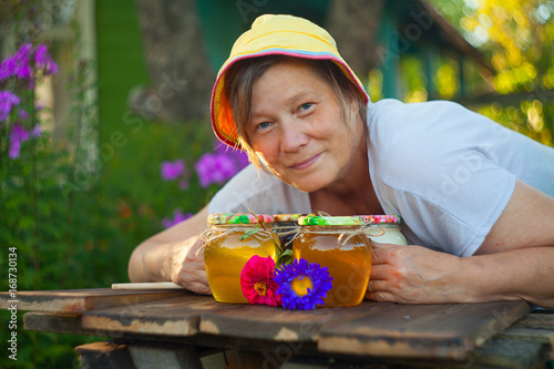 Delicious delicious honey in jar on table