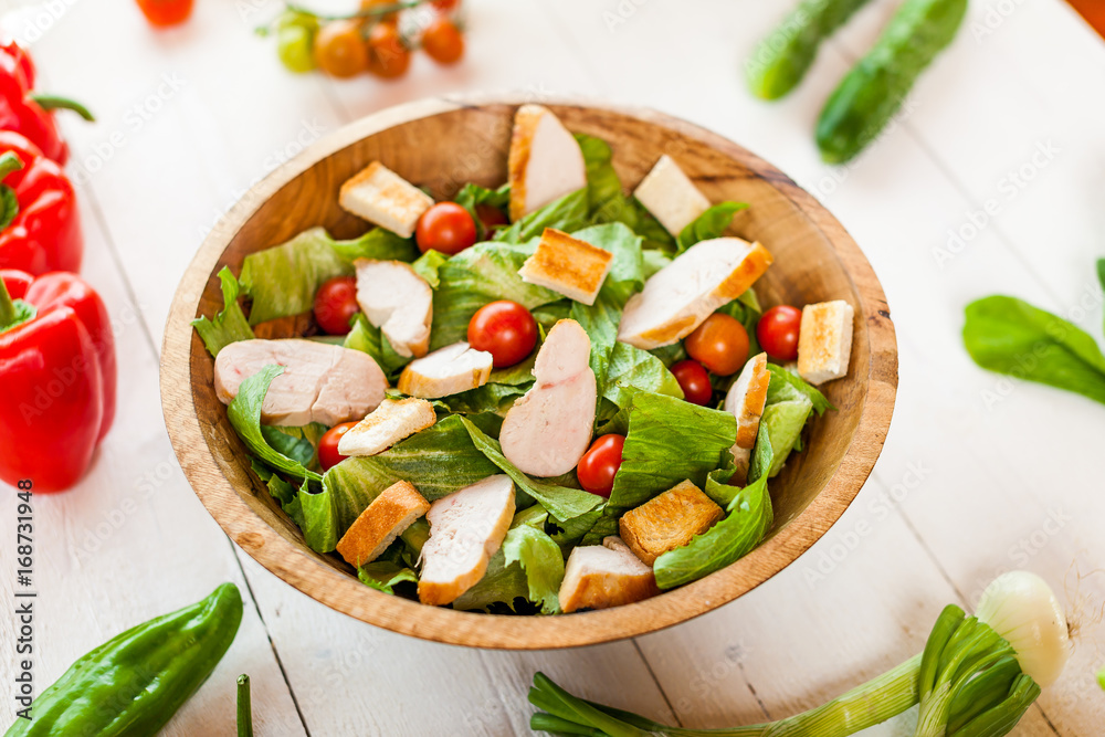 chicken salad bowl on kitchen table, balanced diet chicken salad bowl on kitchen table, balanced diet