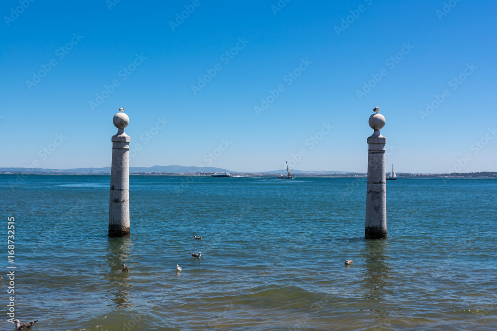 View of Ocean from Shore of Comercio Square in Lisbon Portugal Landscape Daytime View