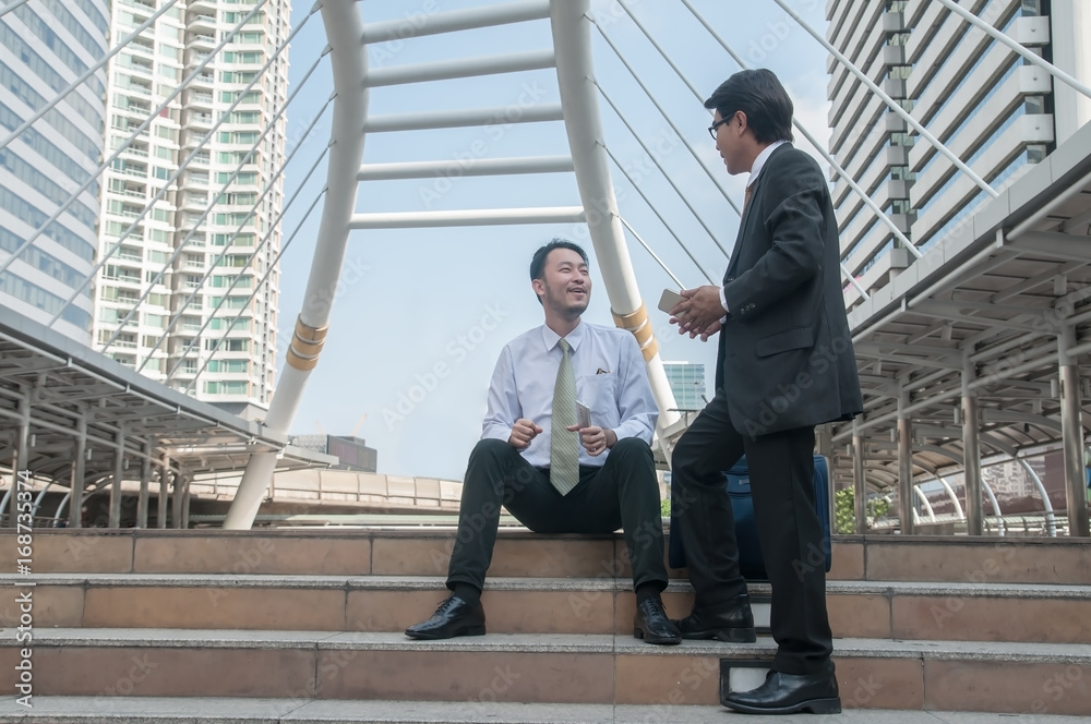 Business people talking anything with their work. Business people talking anything with their work.