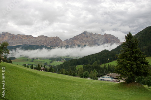 Misty and cloudy alpine landscape