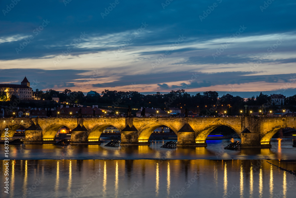 Fototapeta premium Night view on the Charles Bridge over the Vltava river in Prague, Czech Republic