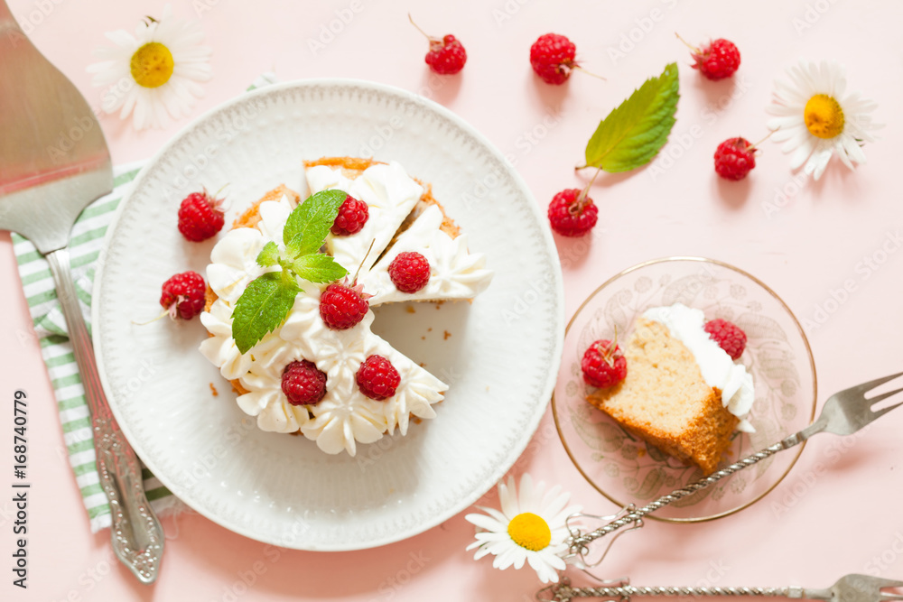Raspberry Cake with whipped cream on pink background Raspberry Cake with whipped cream on pink background