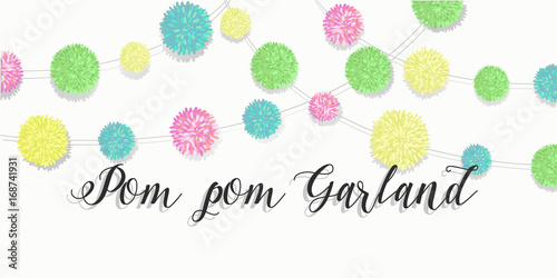 Colorful pom pom garland over white background