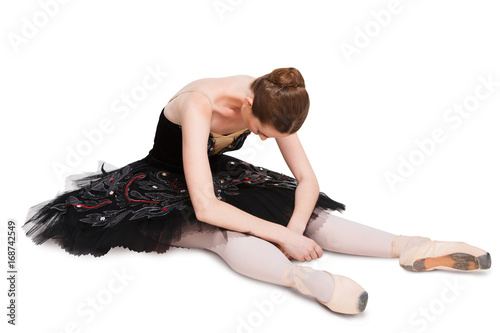 Tired ballerina in black on isolated background