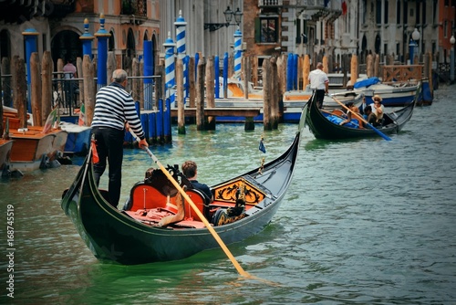 Gondola in canal in Venice
