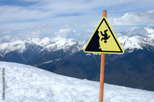 Safety sign in snow mountains