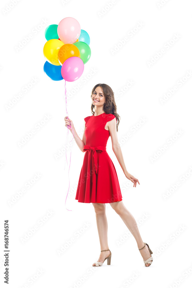 Happy beautiful woman in red dress holding colorful balloons Happy beautiful woman in red dress holding colorful balloons