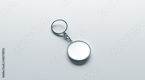 Blank metal round white key chain mock up isometric view, 3d rendering. Clear silver circular keychain design mockup isolated. Empty plain keyring souvenir holder template. Steel circle trinket label