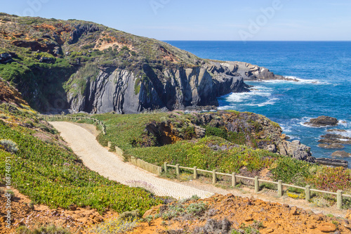 Trekking route and cliffs in the Beach in Almograve photo