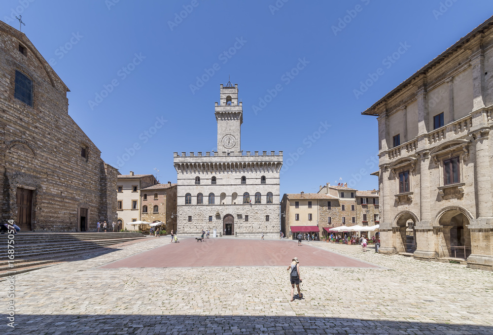 The famous Piazza Grande square and the Palazzo Comunale in Montepulciano, Siena, Italy, on a sunny day