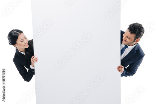 businesspeople with empty board