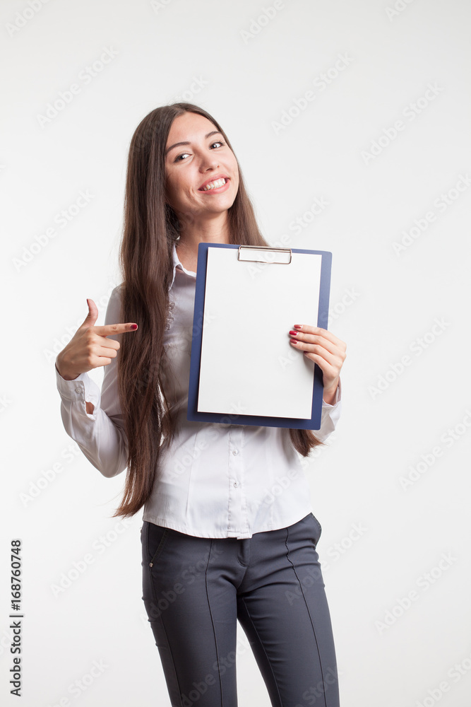 Beautiful woman wearing formal wear. Secretary with clipboard Beautiful woman wearing formal wear. Secretary with clipboard