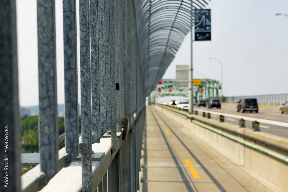 Close up of a bridge fence with a blured background Close up of a bridge fence with a blured background