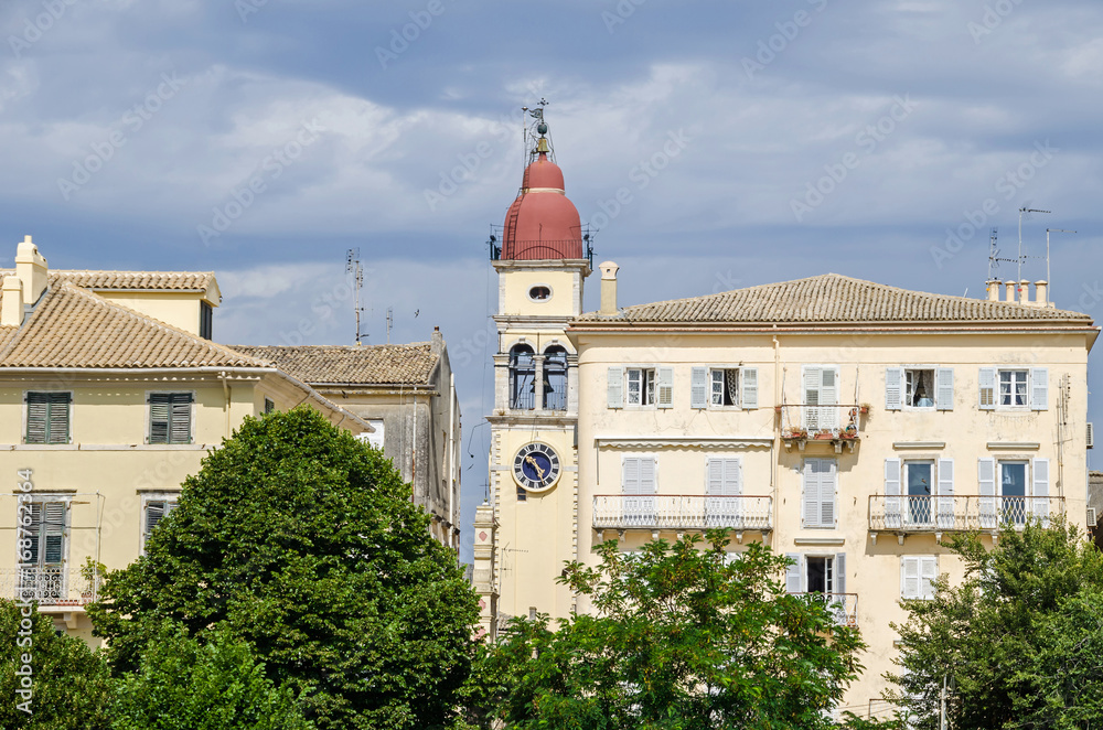 The bell tower of the Saint Spyridon Church and apartments stores  in the old city of Corfu