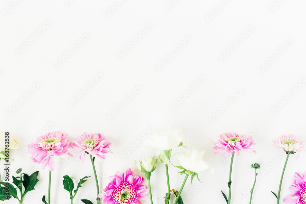 Frame made of pink and white flowers isolated on white background. Floral composition. Flat lay, top view.