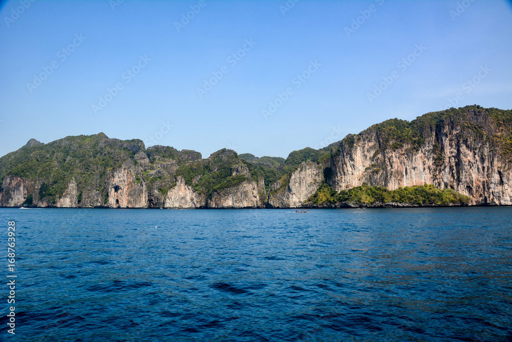 Phi Phi Islands are a small archipelago in the Andaman Sea, belonging to the Thai province of Krabi in the south of the country Phi Phi Islands are a small archipelago in the Andaman Sea, belonging to the Thai province of Krabi in the south of the country