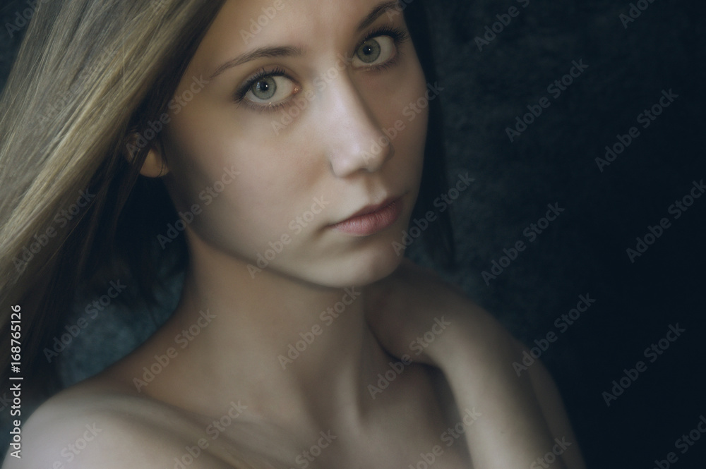 Close up portrait of young white woman with green eyes Close up portrait of young white woman with green eyes