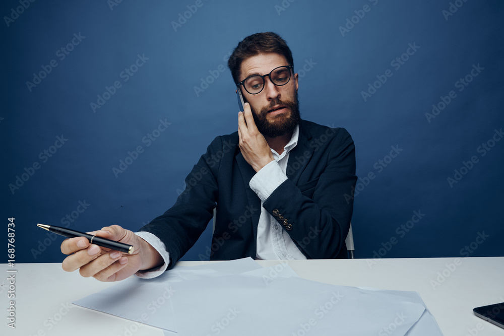 Business man with a beard working at the office Business man with a beard working at the office