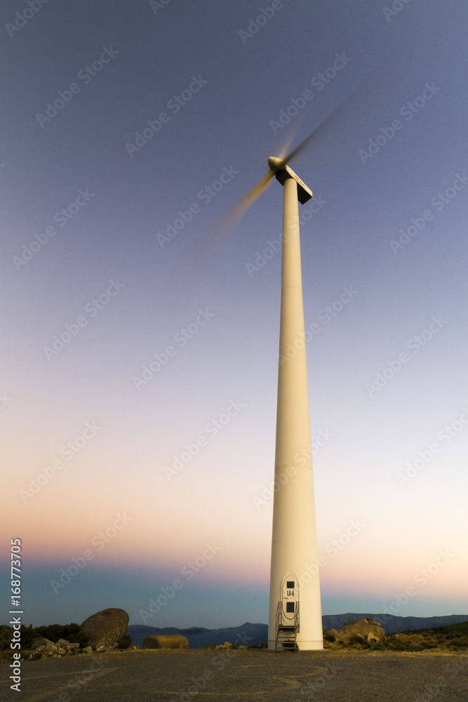 Wind Turbine at Sunset.