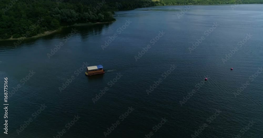 Boat on the river, from the altitude, nature, landscape, 4k, drone, coast, channel Boat on the river, from the altitude, nature, landscape, 4k, drone, coast, channel