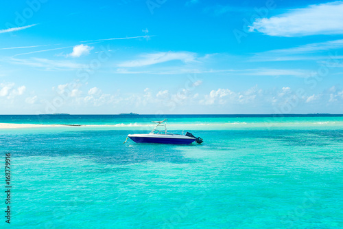 Powerboat in the crystal water of the Indian Ocean, Maldives © Myroslava