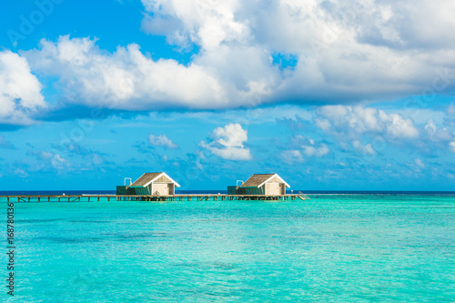 Wooden villas over water of the Indian Ocean, Maldives