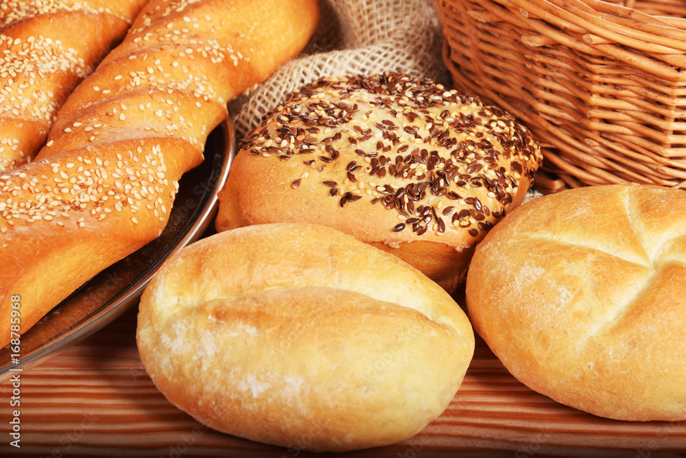 Crunchy bagels and baguette with seeds