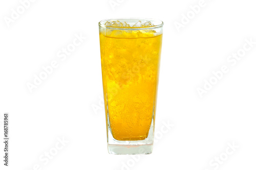 Refreshing orange soda soft drinks with ice in a clear tall glass isolated on white background
