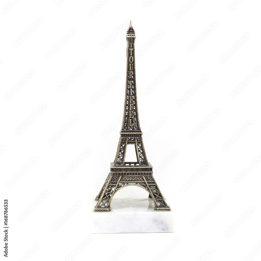 Paris Eiffel tower miniature on the marble stand isolated on white background
