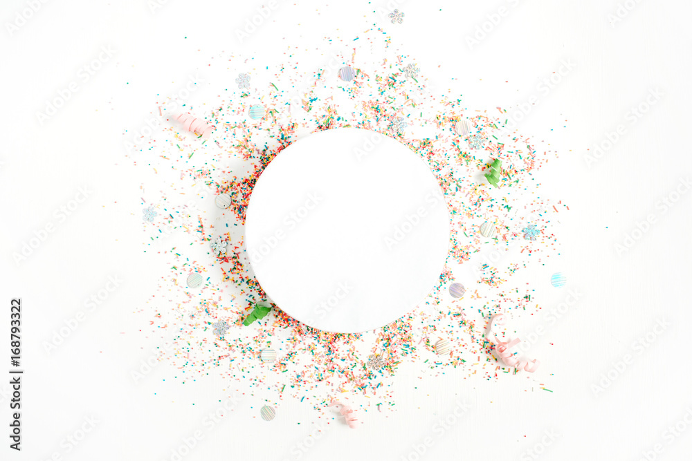 Creative round layout with copy space made of colorful confetti on white background. Celebration concept background. Flat lay, top view. - obrazy, fototapety, plakaty 