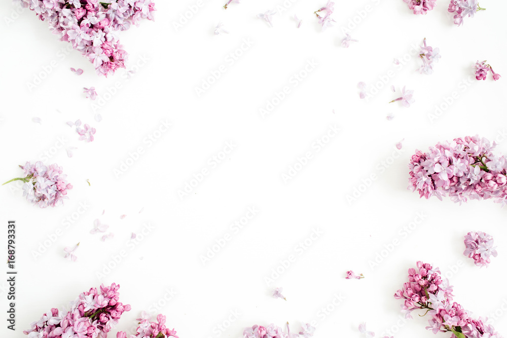 Frame of lilac flowers with space for text on white background. Flat lay, top view Frame of lilac flowers with space for text on white background. Flat lay, top view