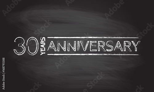 30 years hand drawn emblem, icon or label isolated on blackboard texture with chalk rubbed background. Anniversary design element. Vector illustration.