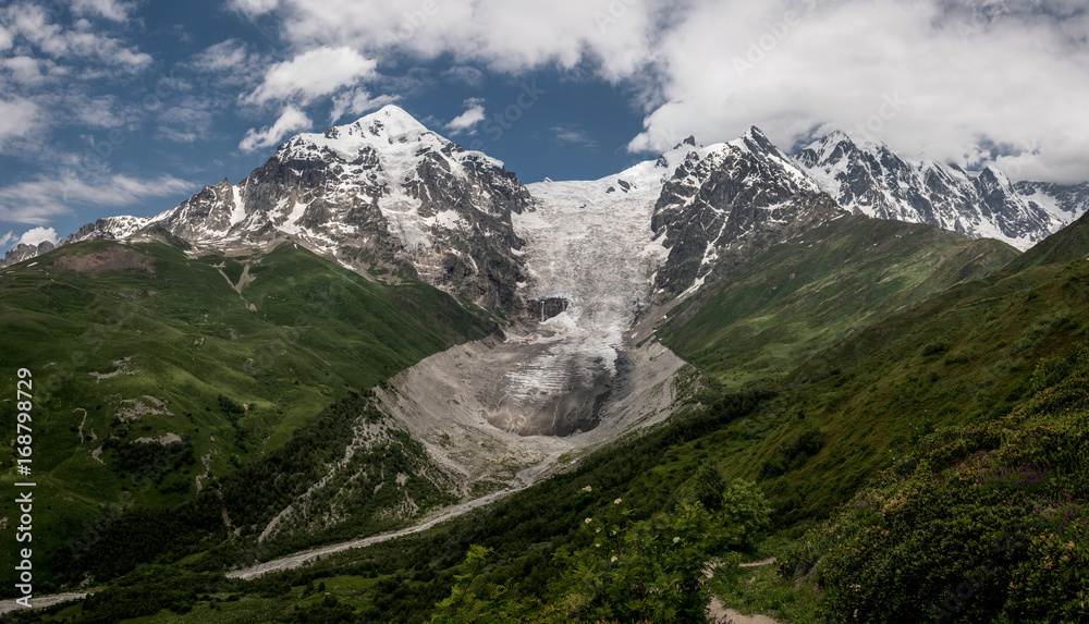 Panoramic view of Tetnuldi mountain and glacier with ice tongue in Caucasus mountains, Svaneti, Georgia