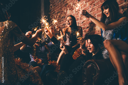Friends having New Year party
