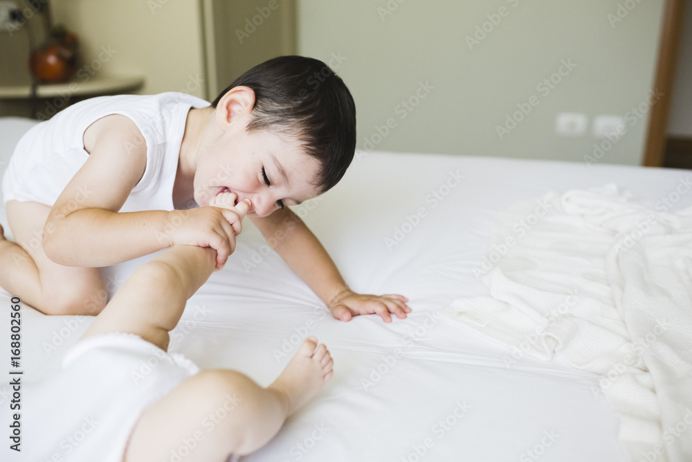 Little Boy Kissing The Feet Of His Little Sister Stock Photo Adobe Stock little-boy-kissing-the-feet-of-his-little-sister-stock-photo-adobe-stock