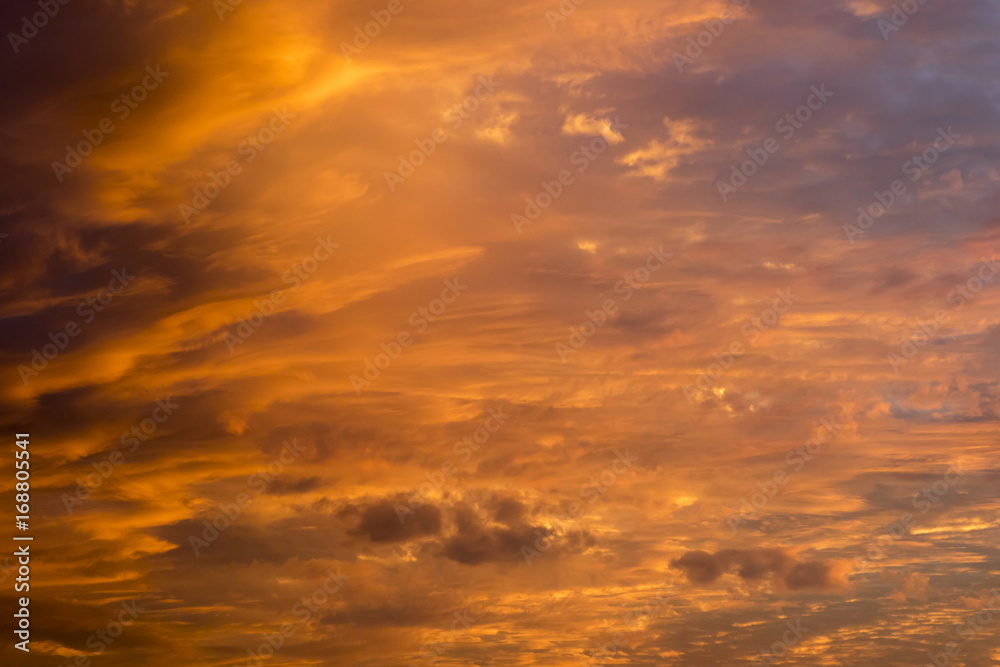 Beautiful clouds at sunset, improbable sky