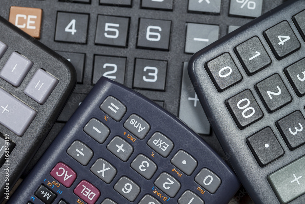Close up of calculator keypads bunched together Close up of calculator keypads bunched together