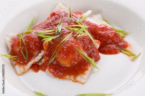 ravioli with tomato sauce on a plate