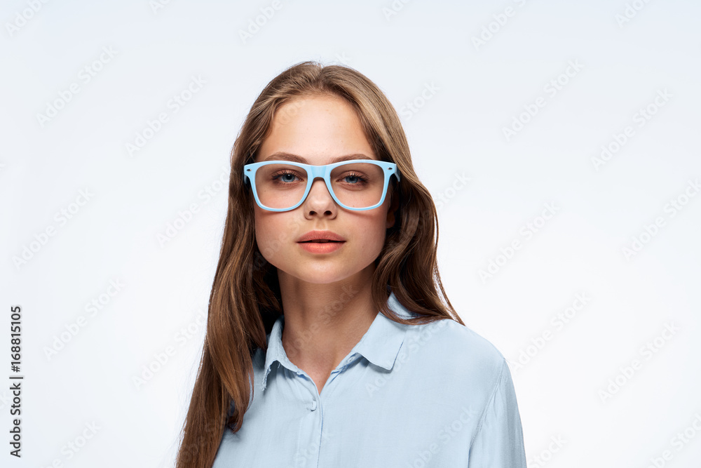 Beautiful young woman on white isolated background, portrait